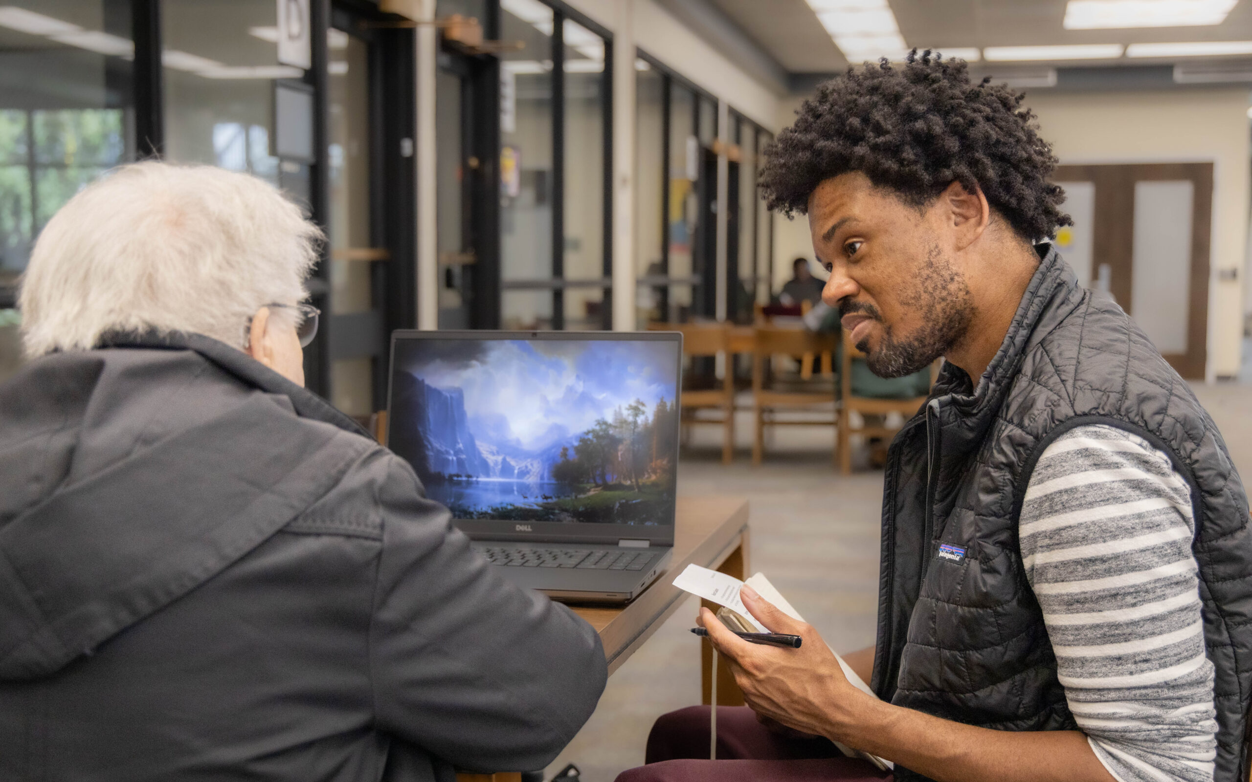 UMD student works with an older adult